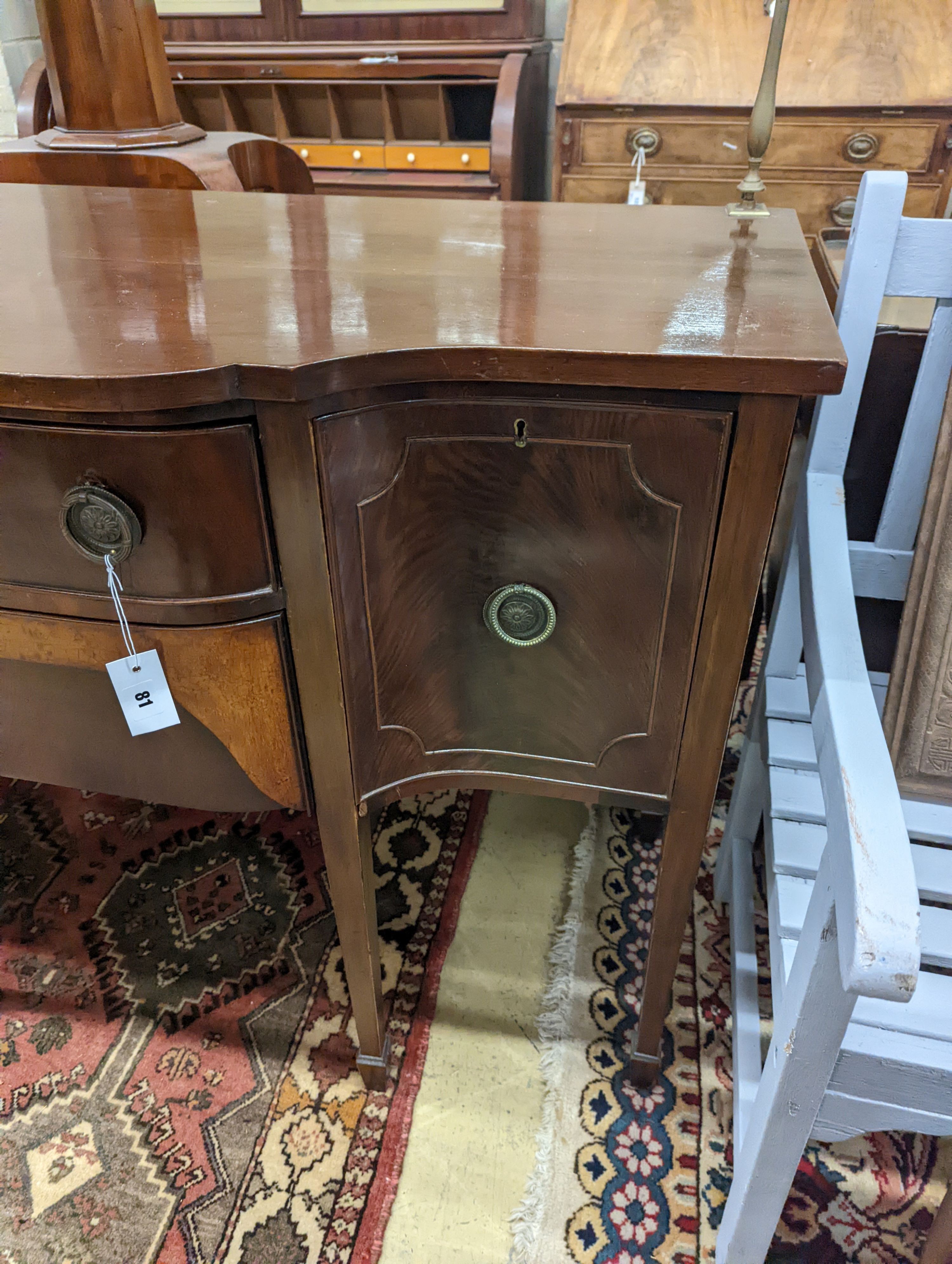 A small George III style mahogany bow front sideboard, length 117cm, depth 55cm, height 85cm